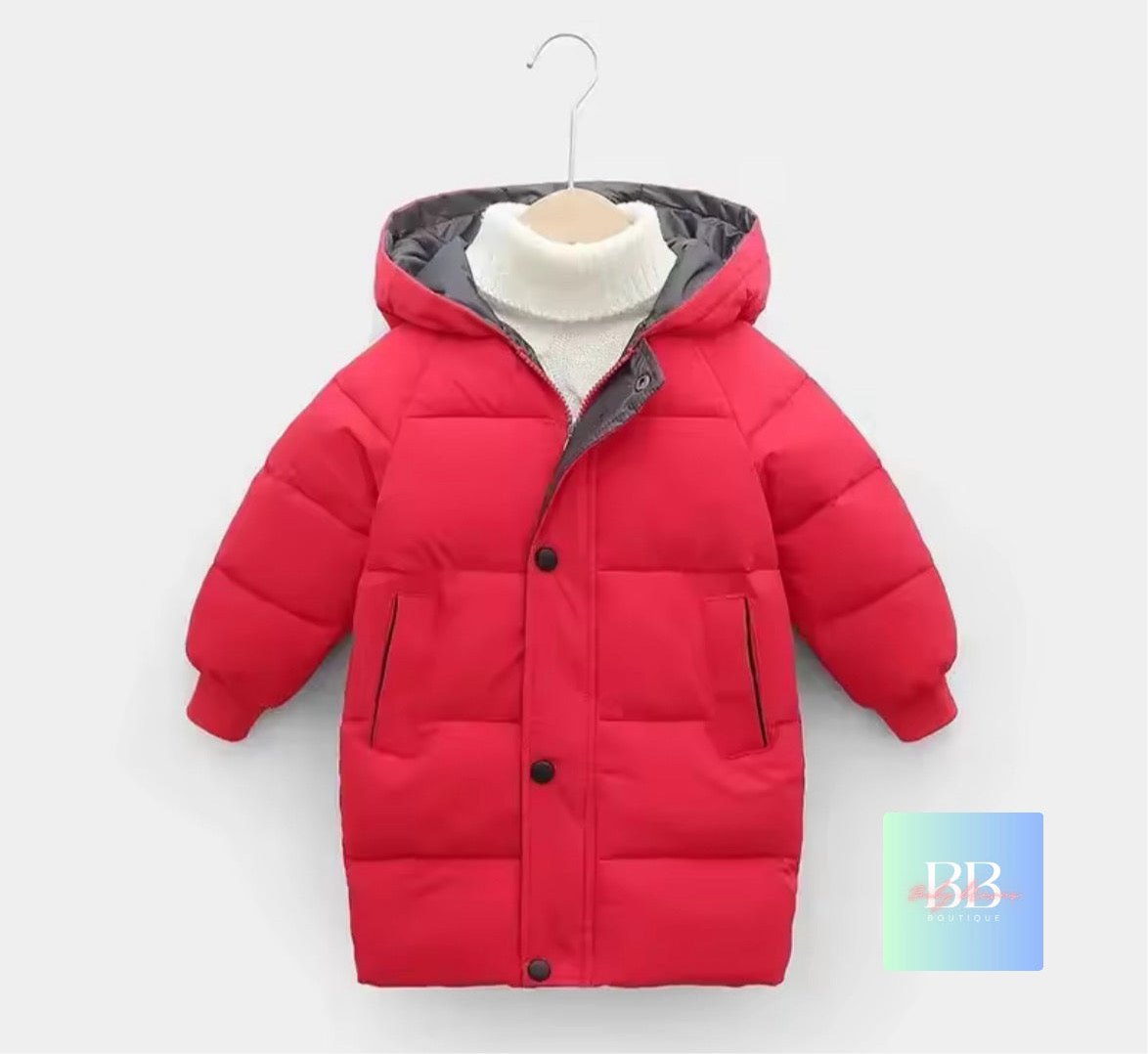 Red children's puffer jacket on a hanger against a white background