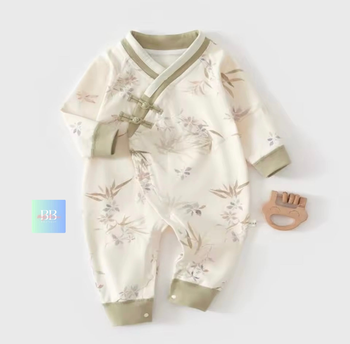 Baby romper with floral pattern on a white background
