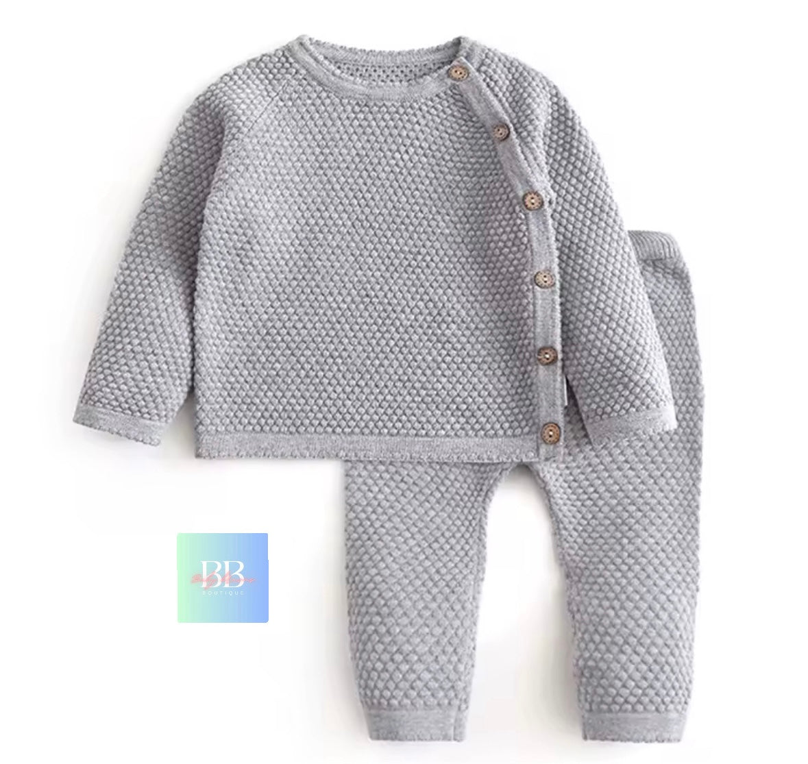 Gray textured baby outfit with long-sleeve top and pants on a white background