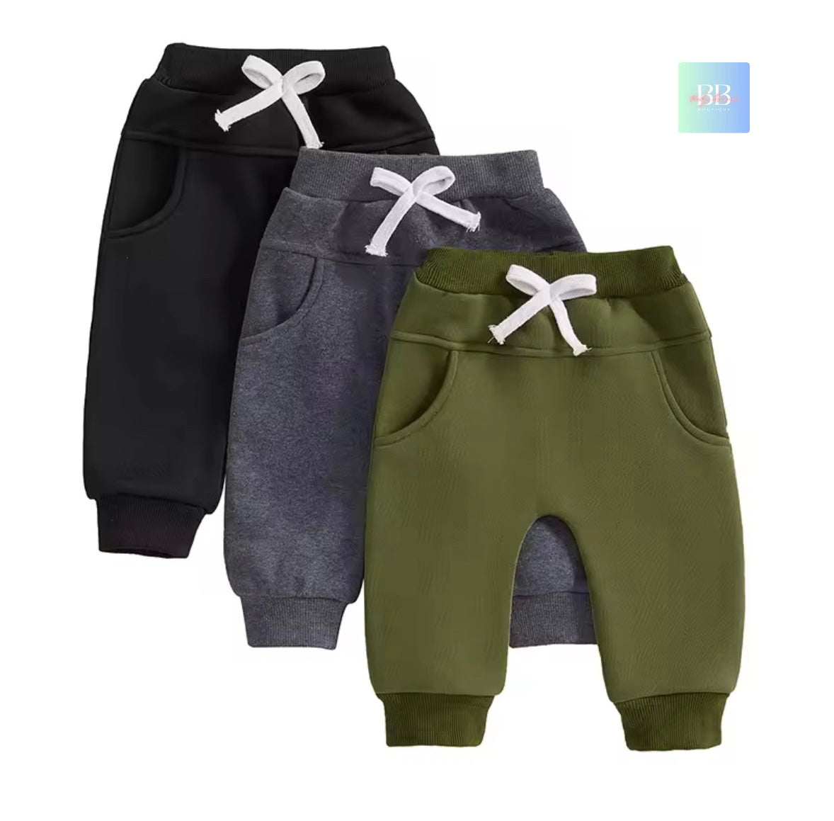 Three pairs of baby pants in black, gray, and green with white drawstrings on a white background.