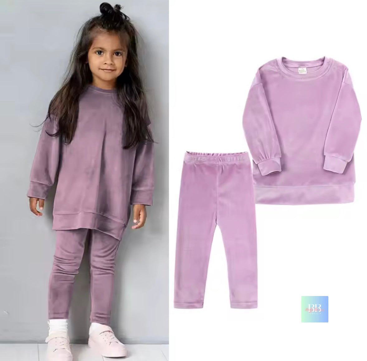 Child wearing a purple outfit with matching pants, standing next to the outfit on a white background.