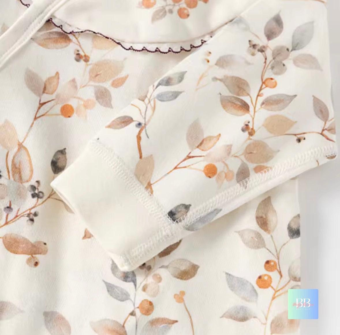 Floral-patterned fabric with a white roll of toilet paper on top