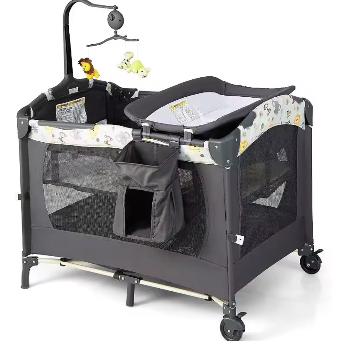 Baby playpen with changing table and toy bar on a white background