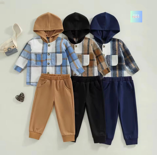 Three children's outfits with plaid shirts, hoodies, and pants in brown, black, and blue on a light gray background.