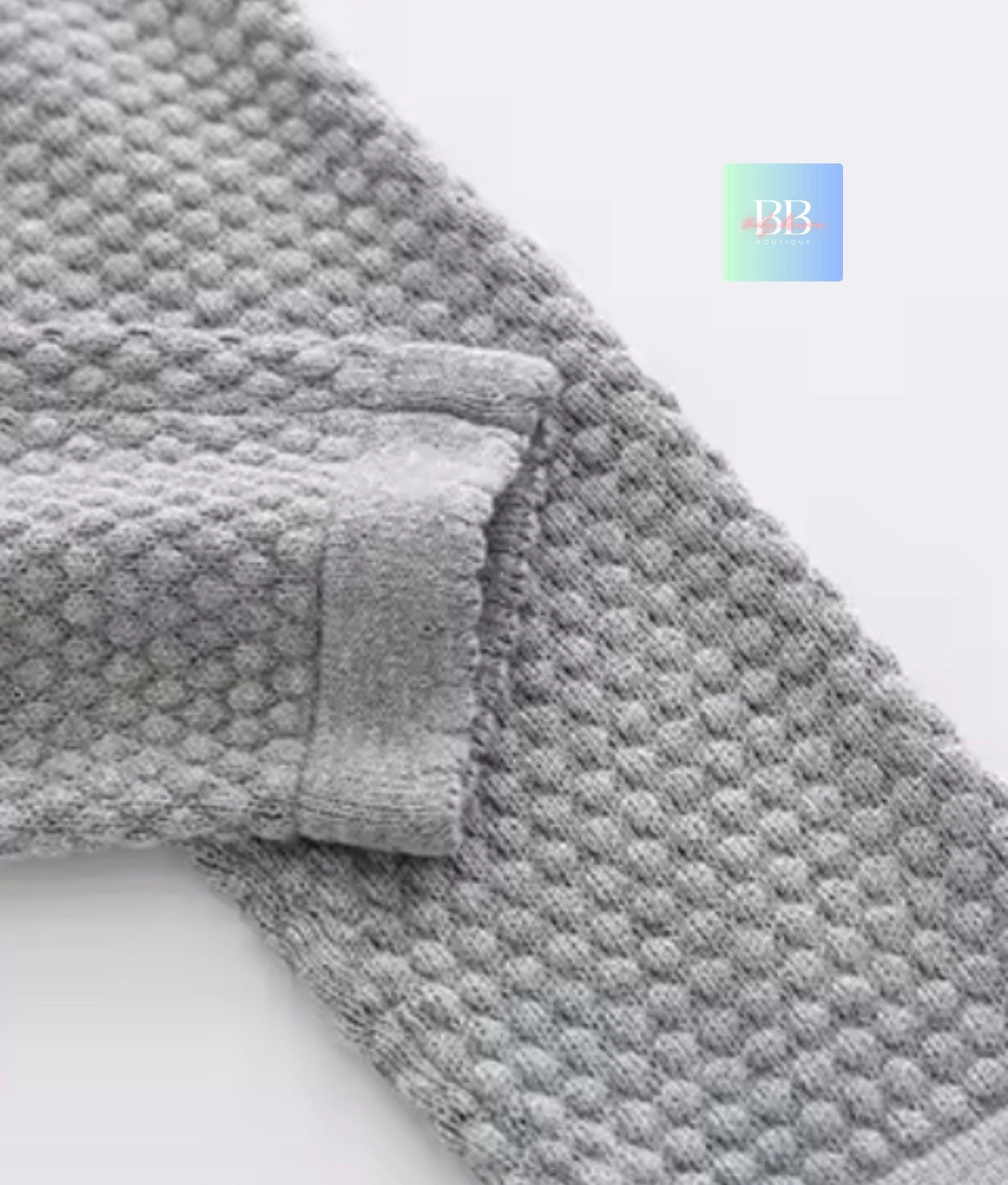 Gray textured towel on a white background