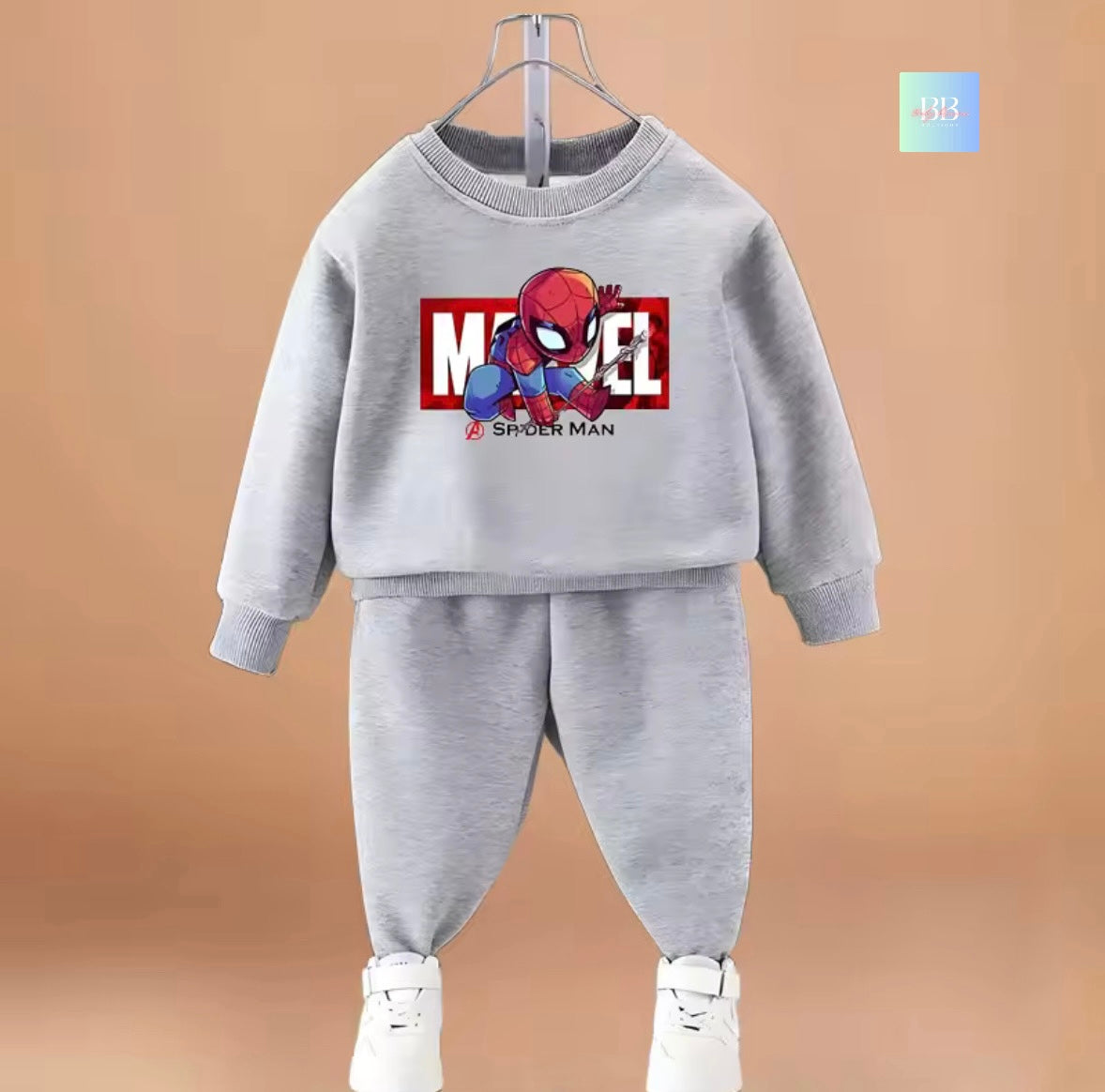 Gray children's sweatshirt and pants set with Spider-Man graphic on a beige background