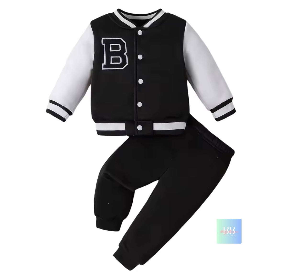 Black and white children's varsity jacket and pants set on a white background