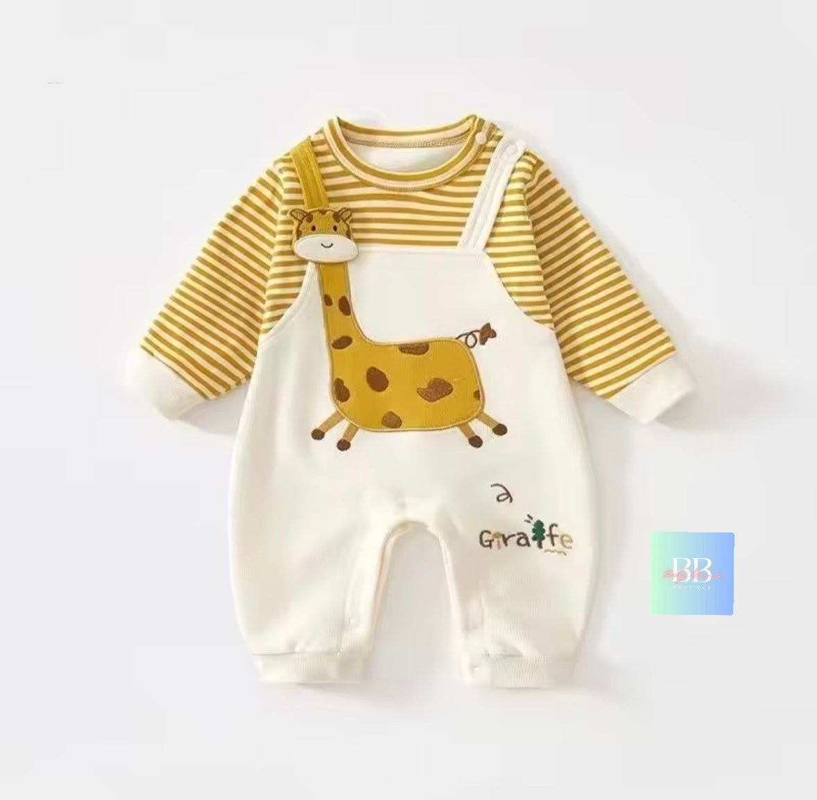 Baby romper with striped long-sleeve top and giraffe design on a white background