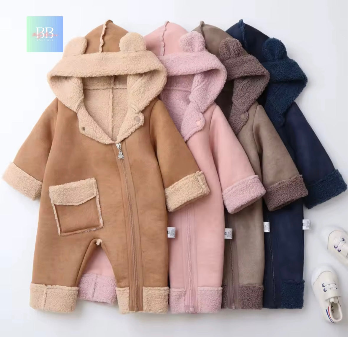 Children's coats with sherpa lining in various colors on a white background