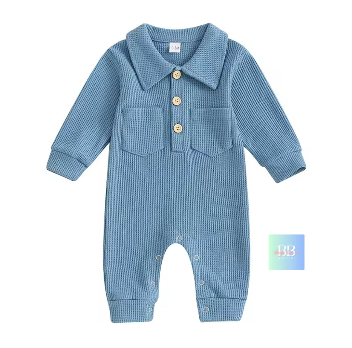 Blue baby romper with button details on a white background