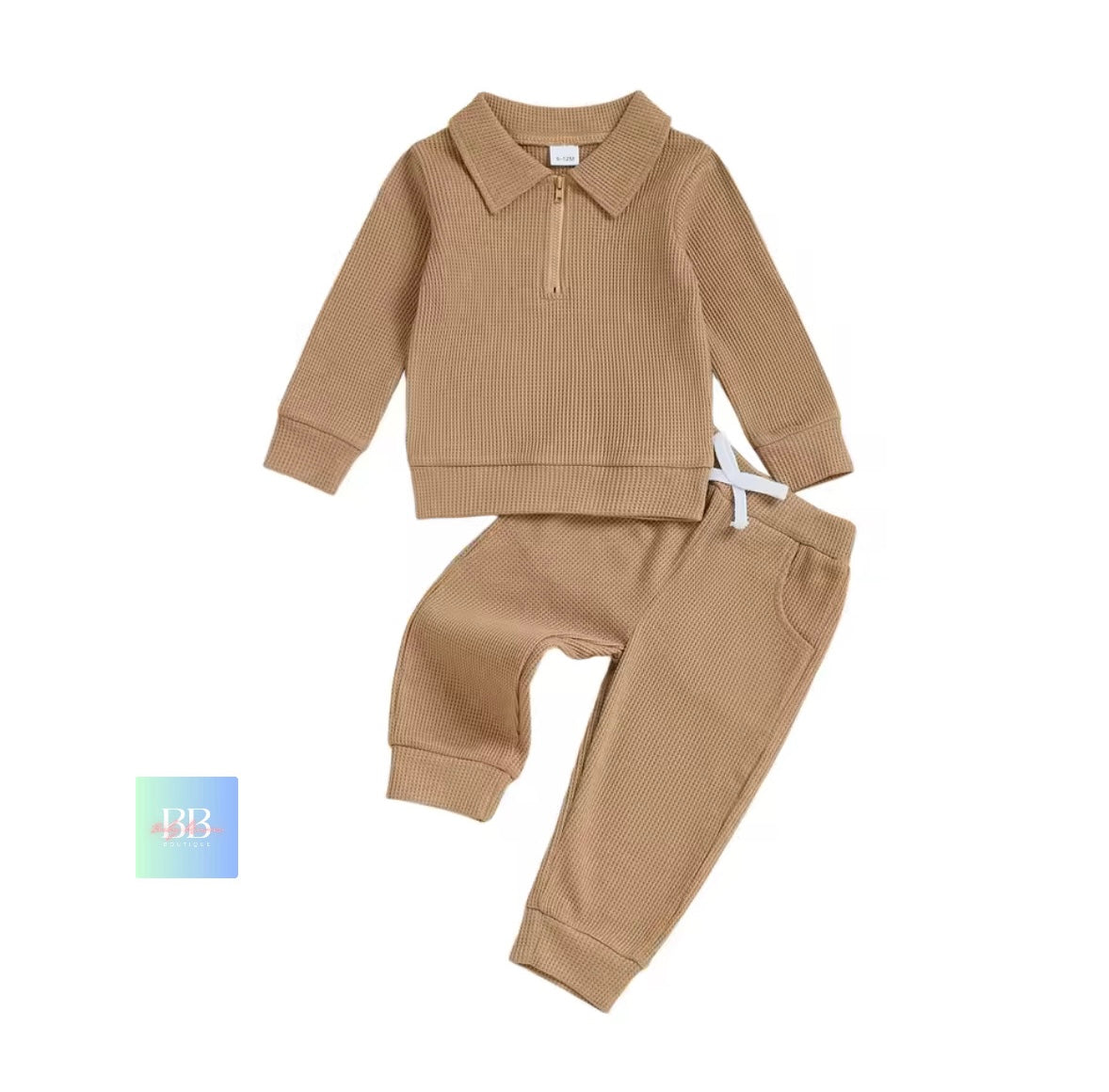 Beige ribbed children's outfit with shirt and pants on a white background