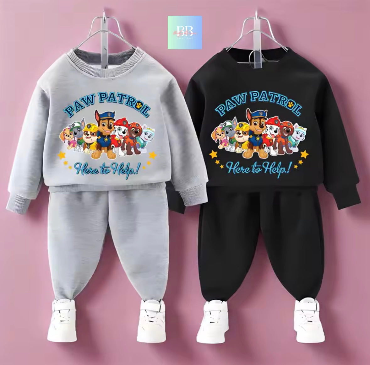 Two children's sweatshirt and pants sets with Paw Patrol design on a pink background