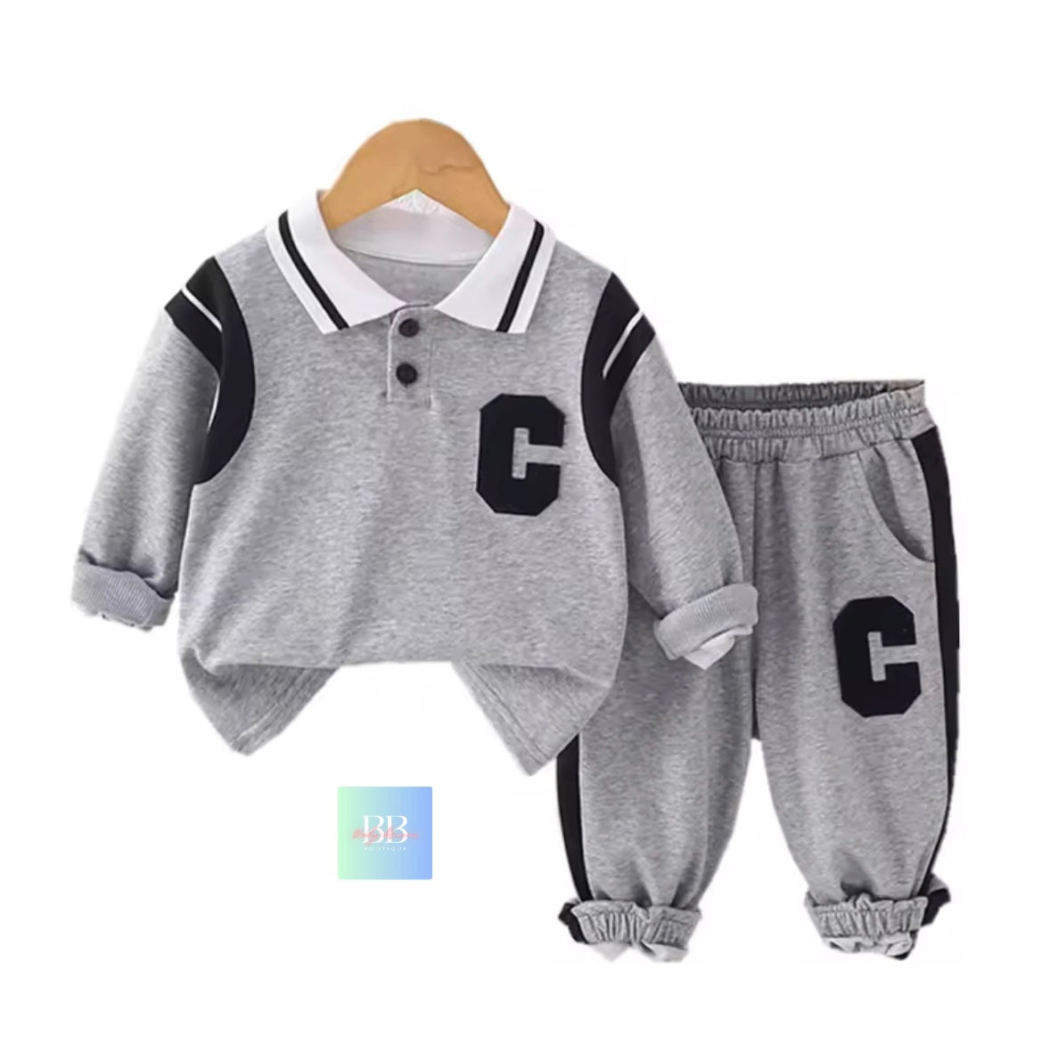Children's gray outfit with black letter 'C' on a white background