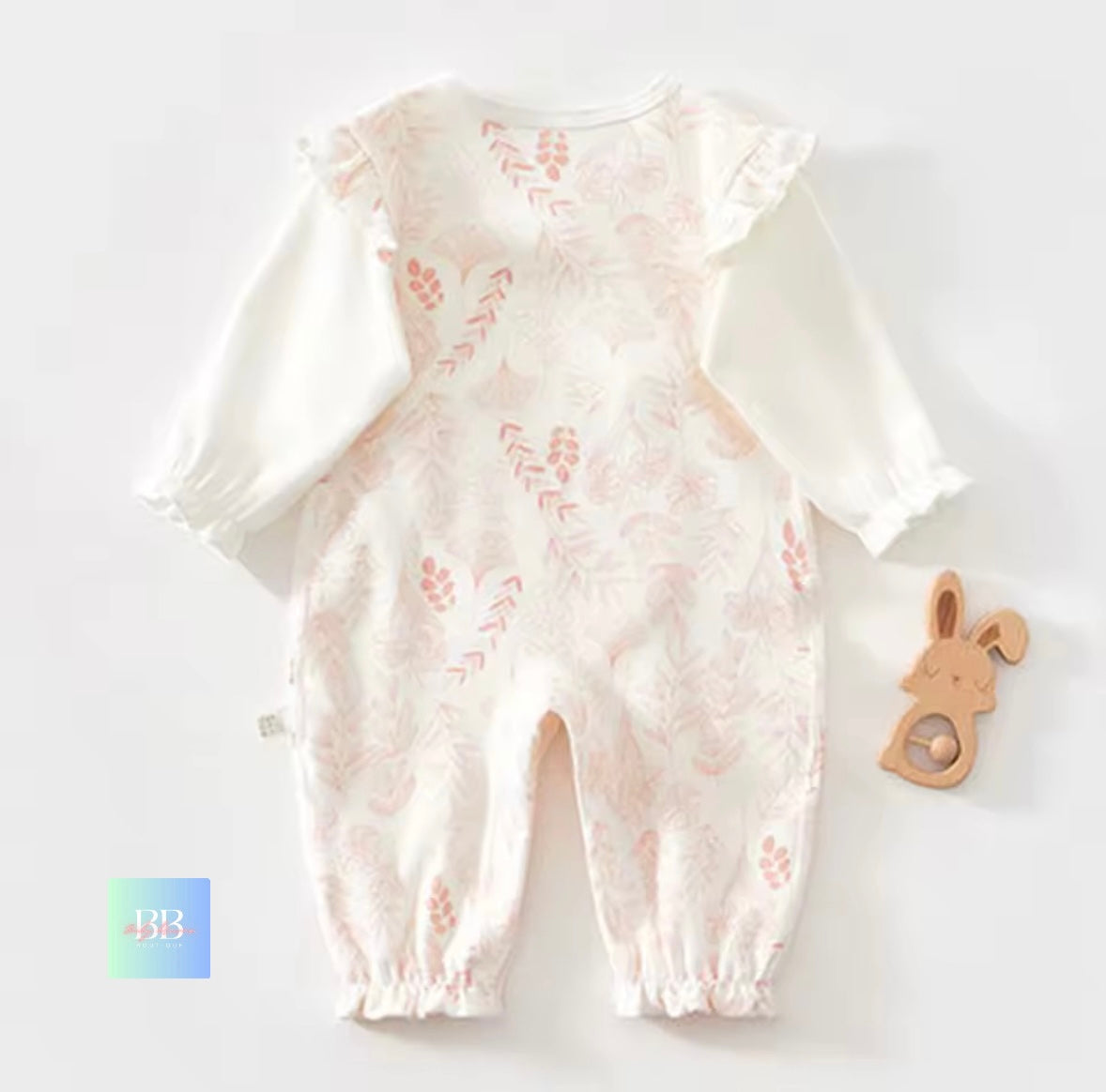 Baby romper with floral pattern on a white background