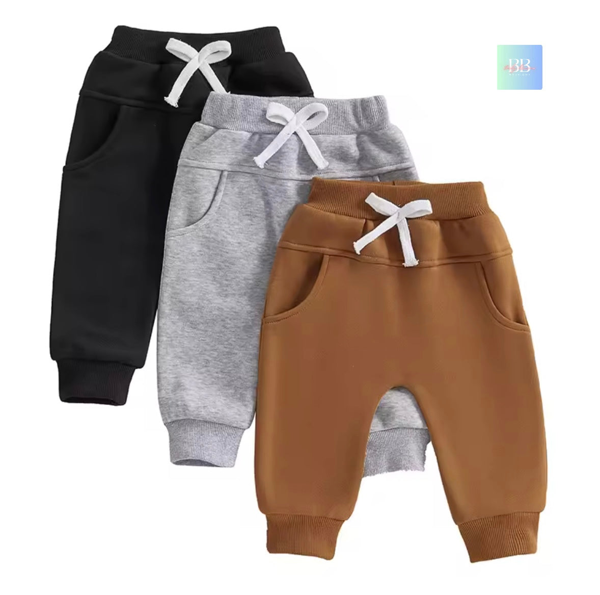 Three pairs of children's sweatpants in black, gray, and brown on a white background.