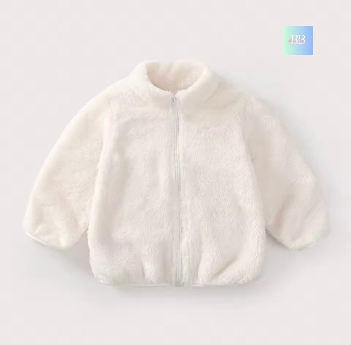 White baby jacket on a light gray background