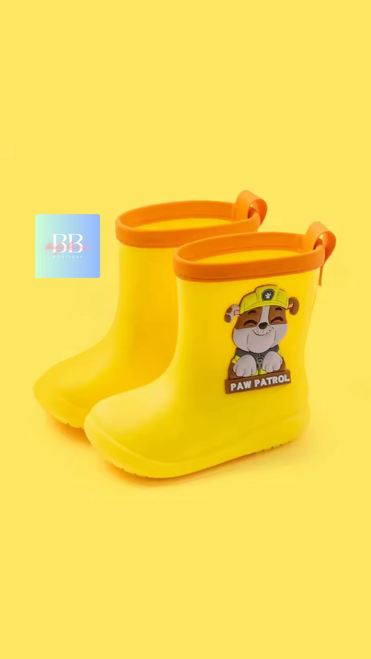 Yellow rain boots with a cartoon character on a yellow background