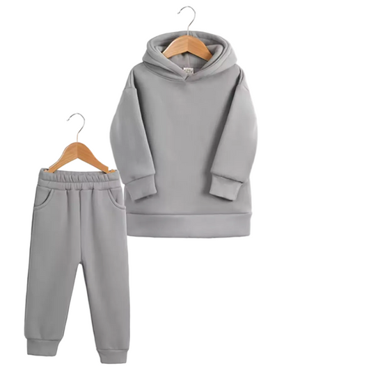 Gray hoodie and pants set on hangers with BB Boutique logo.