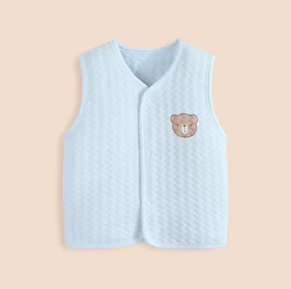 Light blue quilted vest with a teddy bear emblem on a beige background soft cotton waistcoat/bodywarmer