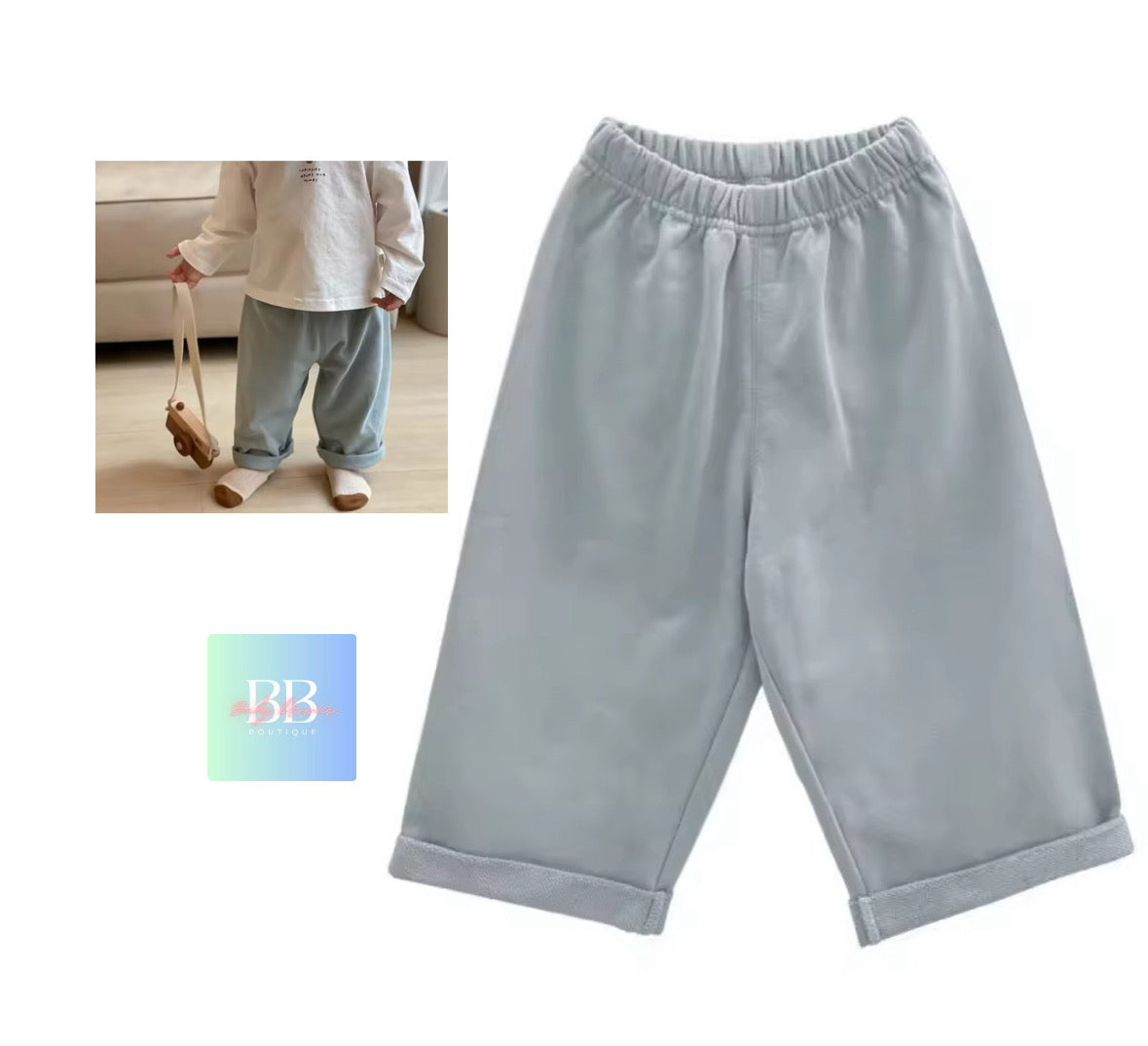 Light blue pants with a child wearing them and a small bag on a white background.