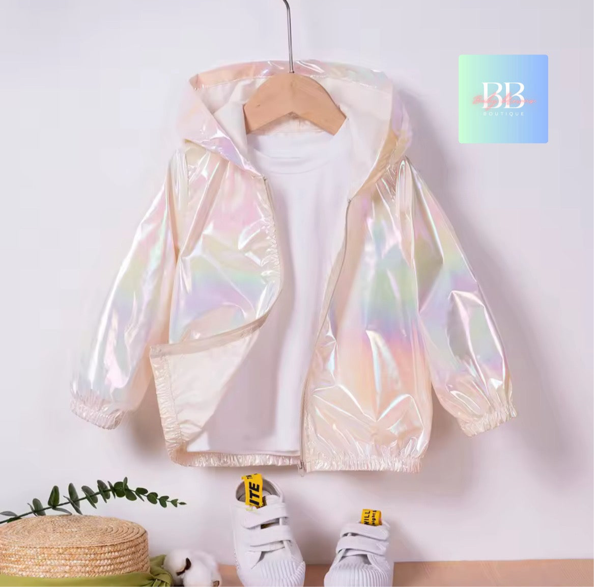 Holographic jacket on a hanger with a minimal background
