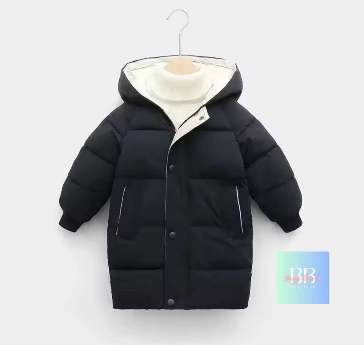 Black puffer jacket with white lining on a hanger against a white background