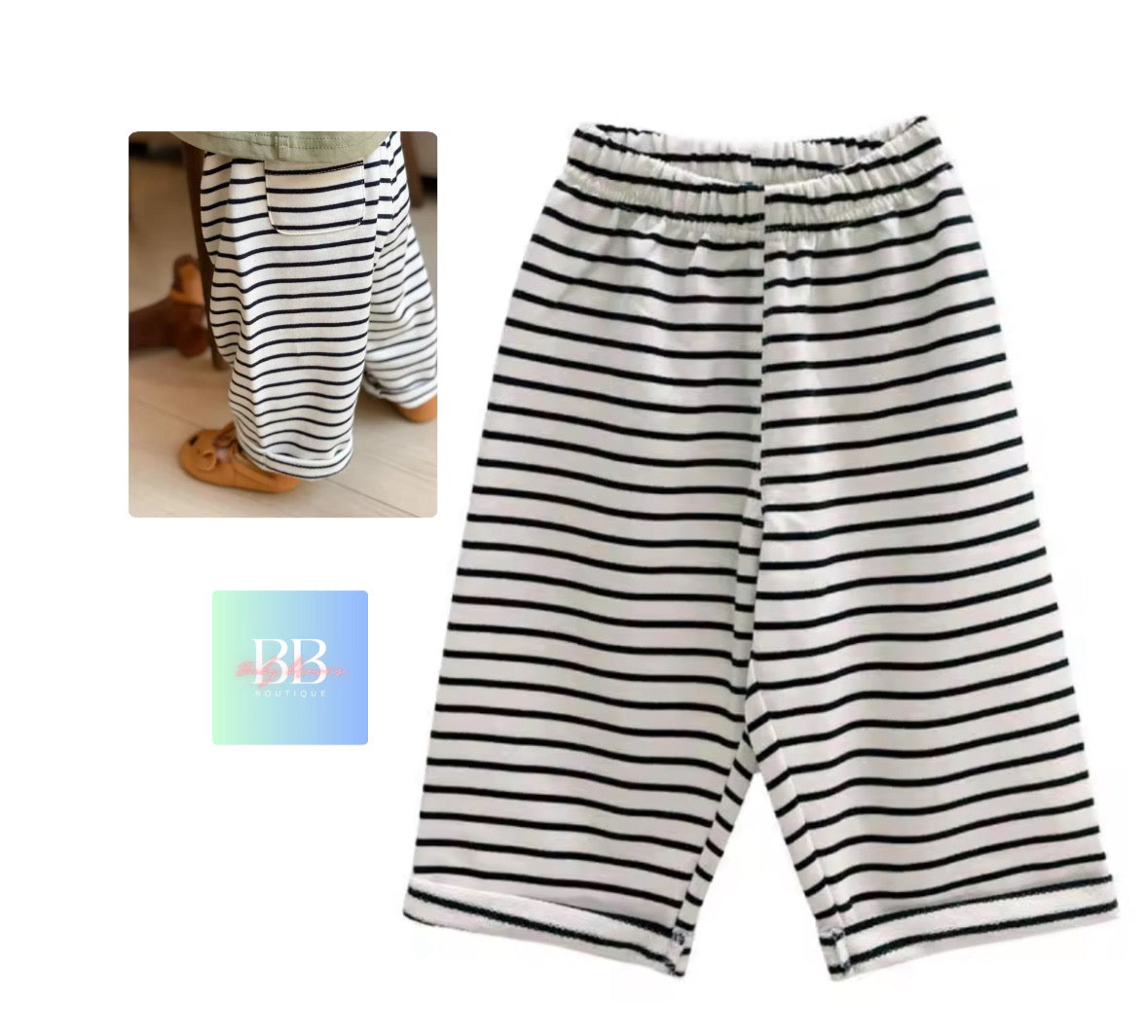 Black and white striped pants on a white background with a small logo in the corner.