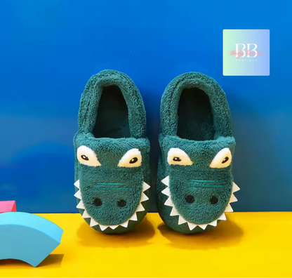 Teal shark-themed slippers on a yellow surface with a blue background