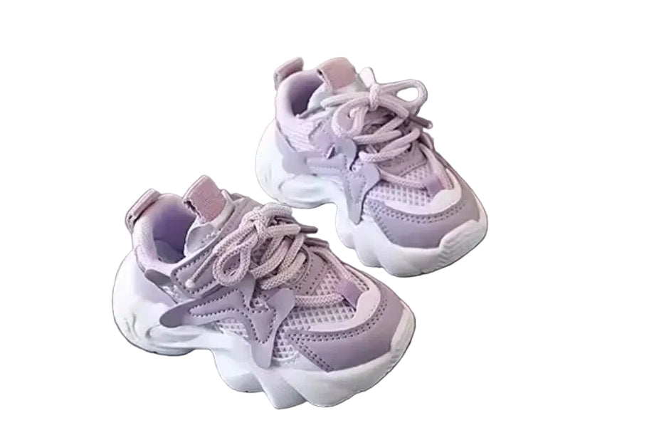 Pair of purple children's sneakers on a gray surface with 'XISHAN 731' branding in the background.