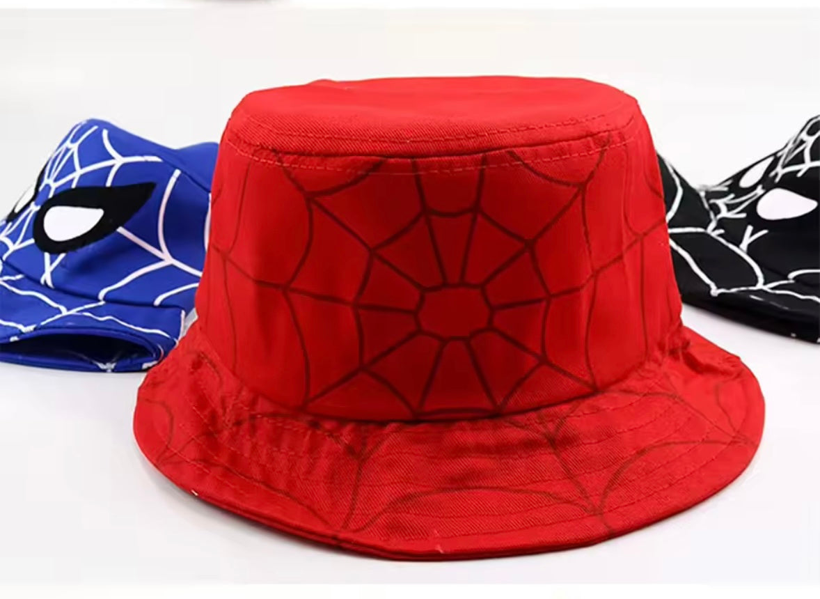 Red bucket hat with spider web pattern on a white background