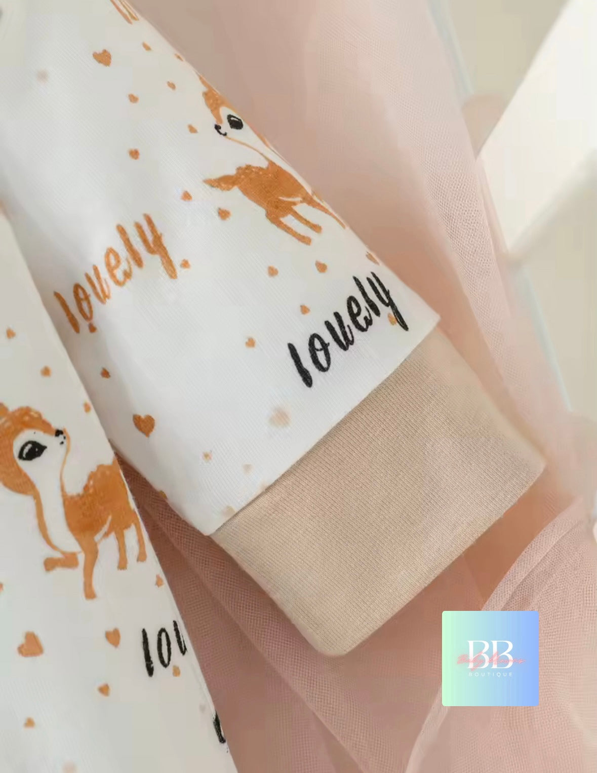 Fabric with printed designs and text on a light background