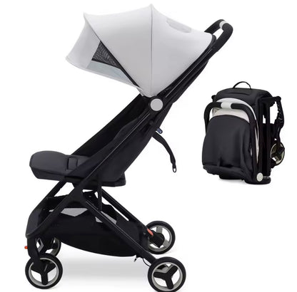 Black stroller with white canopy and matching backpack on a white background