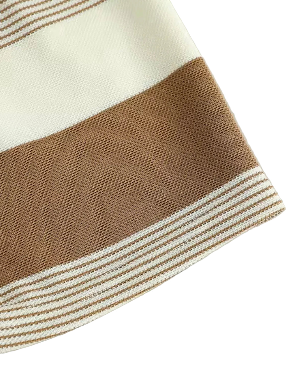 Close-up of a brown and beige striped fabric on a light gray background