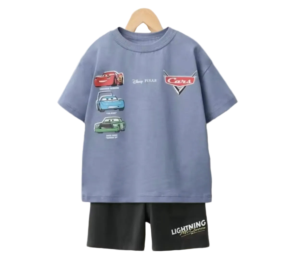 Children's t-shirt with Disney Pixar Cars design on a hanger against a white background