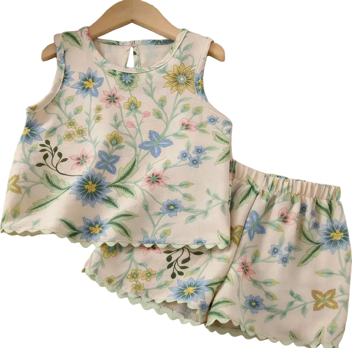 Floral-patterned apron and matching shorts on a textured surface
