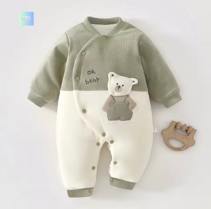 Baby romper with bear design on a white background