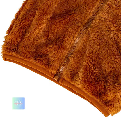 Brown fuzzy blanket with a zipper on a white background