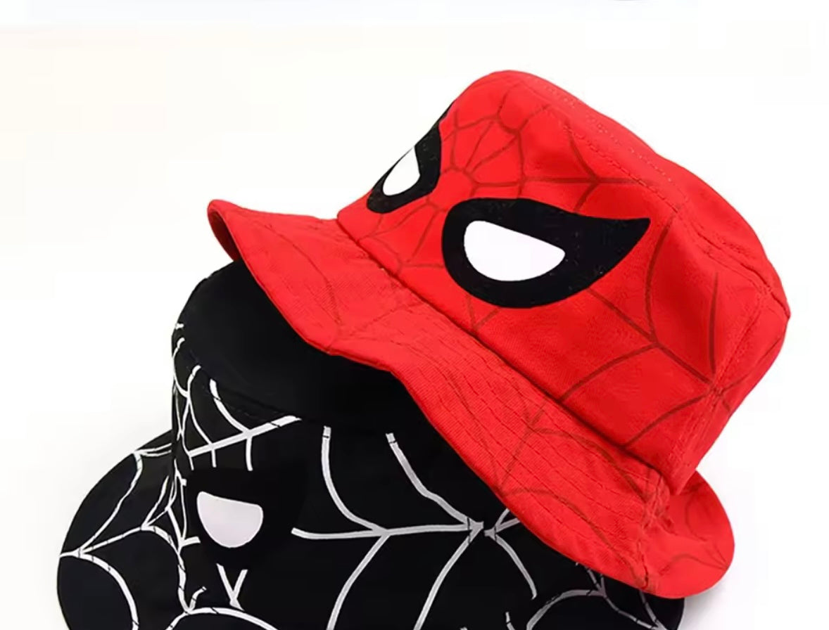Red and black bucket hat with spider web design on a white background