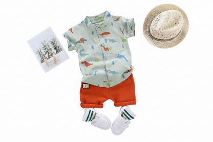 Children's outfit with shirt, shorts, socks, and hat on a white background
