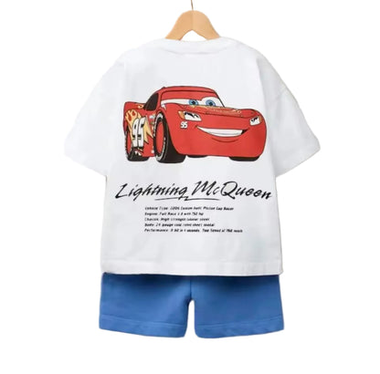 White t-shirt with Lightning McQueen graphic and blue shorts on a hanger