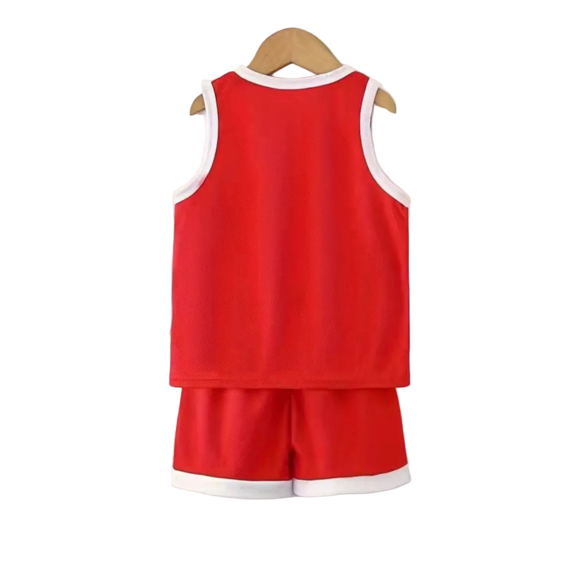 Red tank top and shorts set on a hanger against a white background
