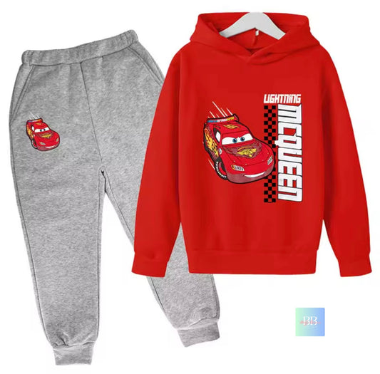 Red hoodie with Lightning McQueen design and gray pants on a white background