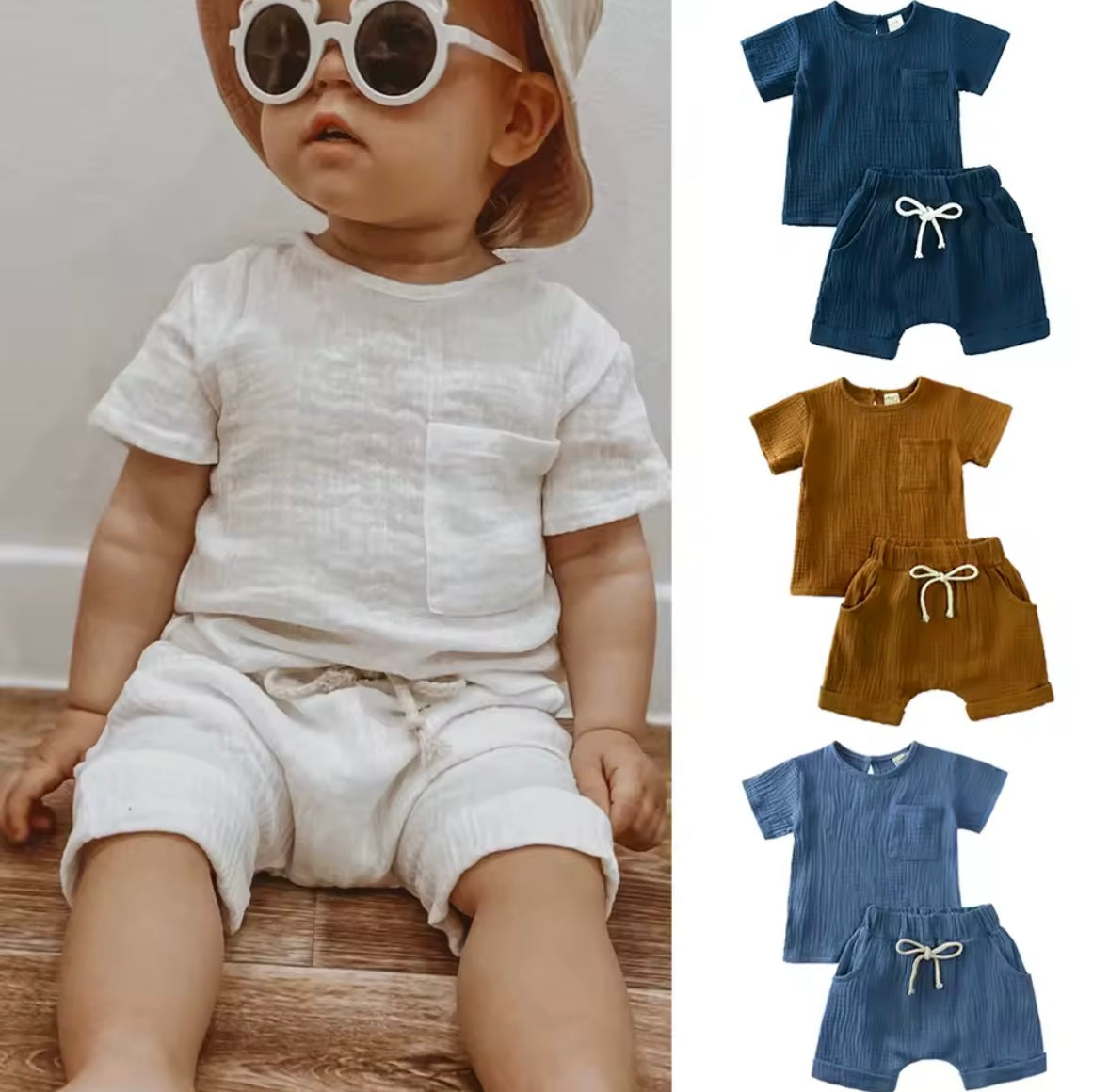 Child wearing a white outfit with sunglasses and a hat, surrounded by blue, brown, and striped outfits.