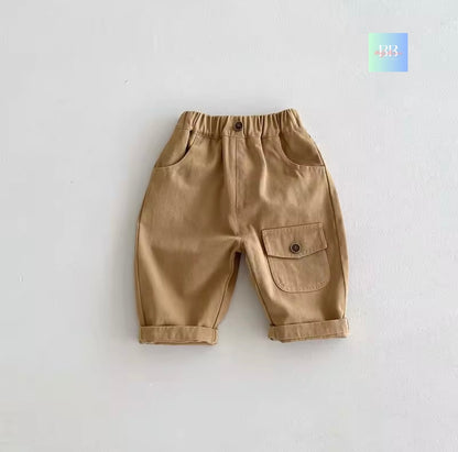 Beige children's pants with a pocket on a light gray background