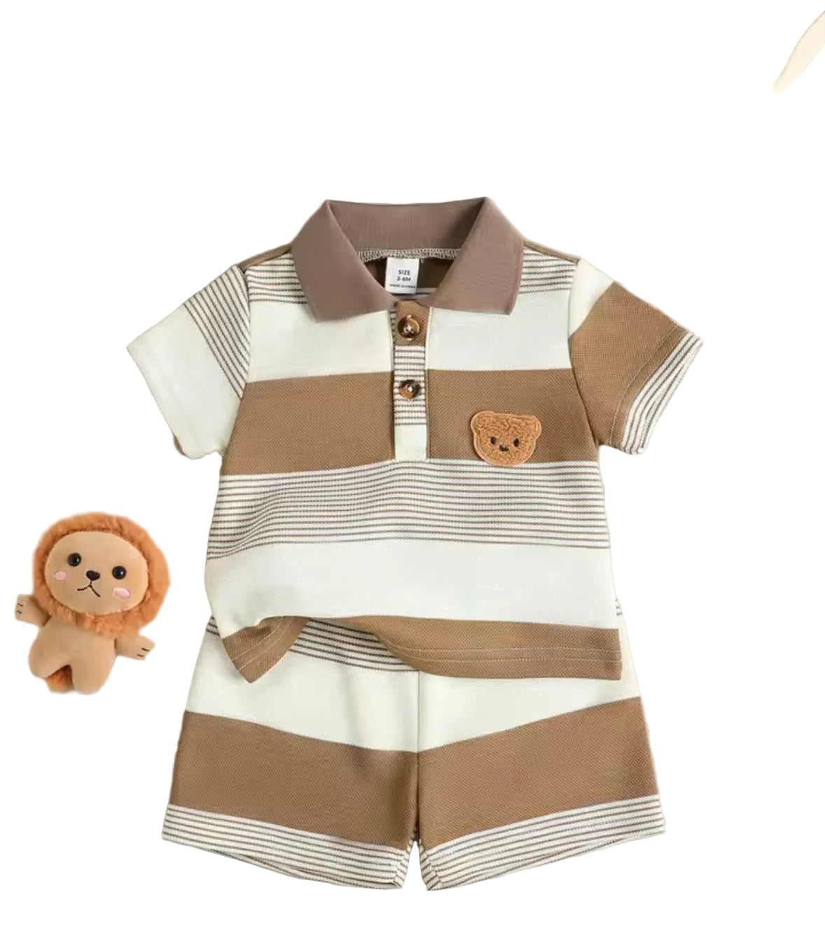Children's striped polo shirt with bear patch and shorts on a light gray background