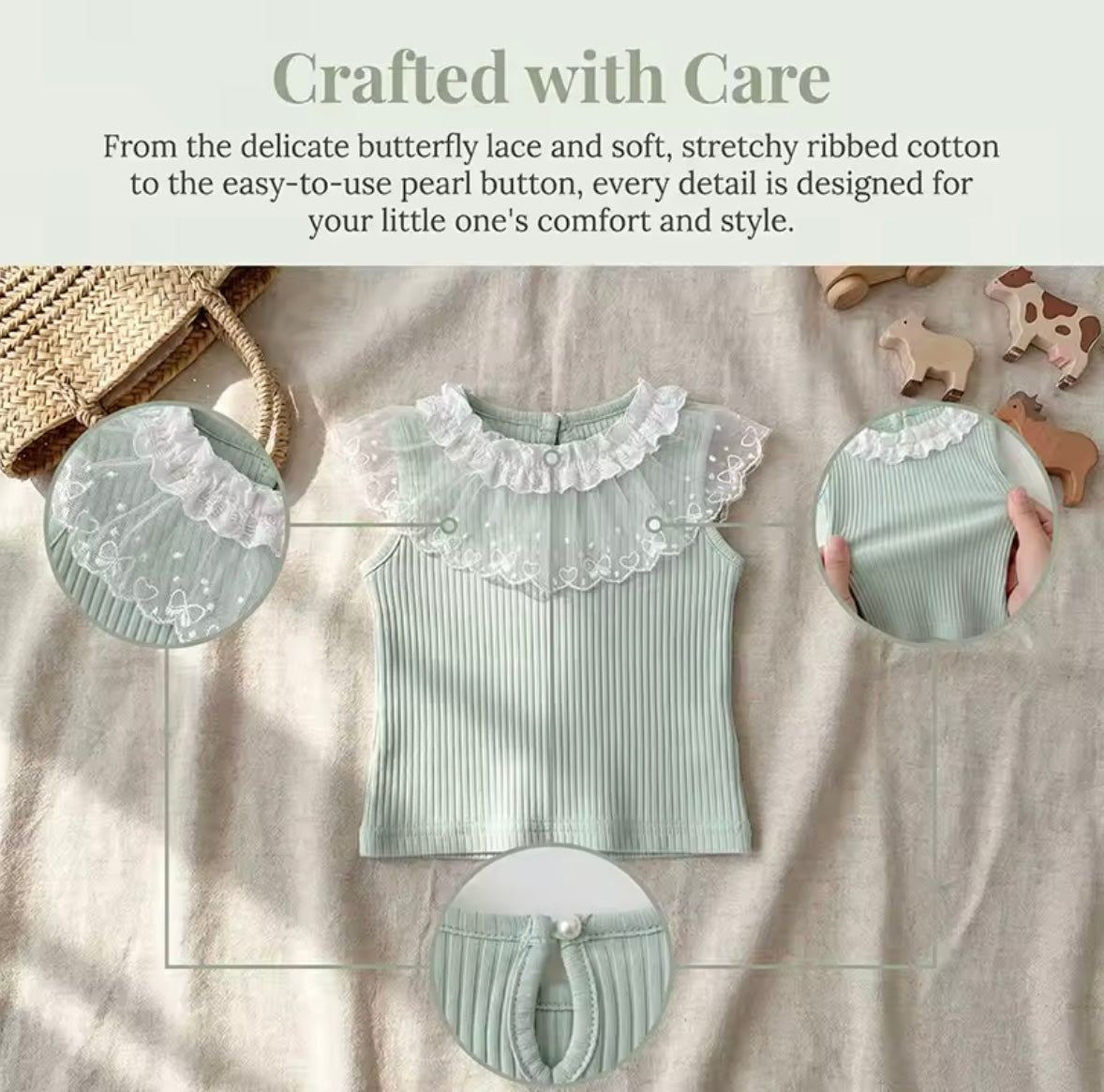 Baby outfit with lace collar on a neutral background