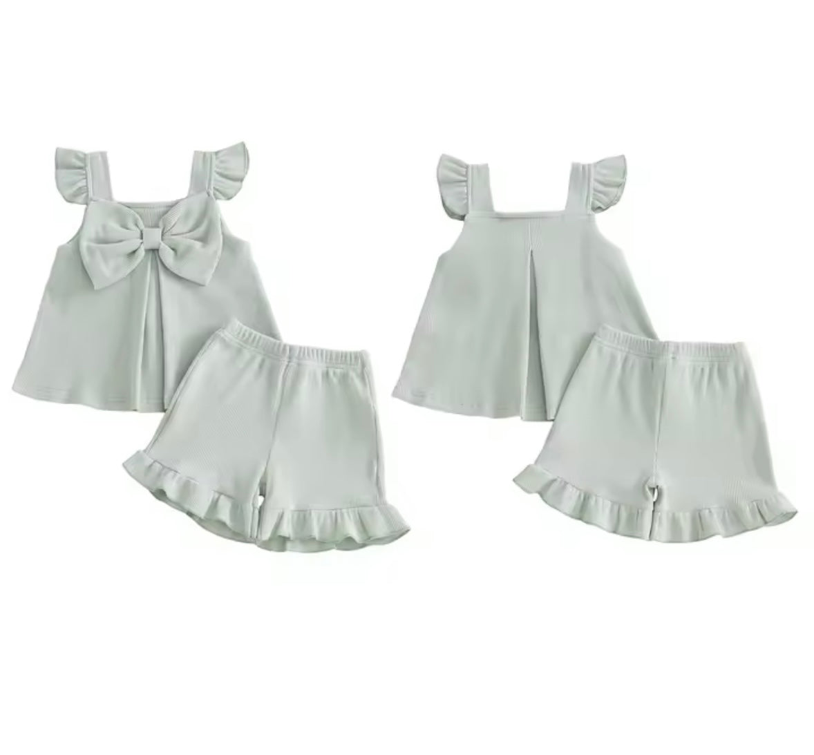 Two matching outfits with light gray tops and ruffled shorts on a white background