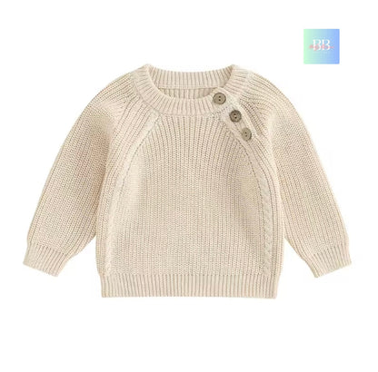 Beige knitted sweater with buttons on a white background