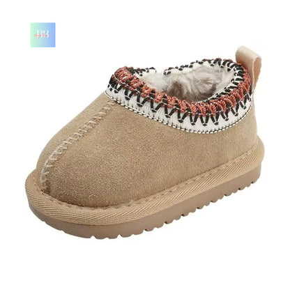 Beige children's slipper with decorative trim on a white background