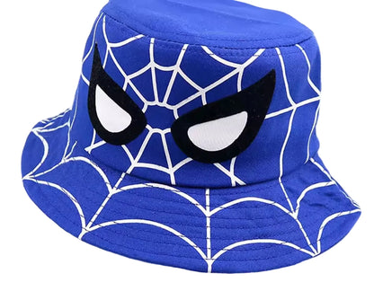 Blue bucket hat with spider web design and black eye masks on a white background